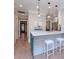 Kitchen with white cabinets and a breakfast bar at 3512 W Granada St, Tampa, FL 33629