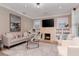 Living room with fireplace, built-ins, and hardwood floors at 3512 W Granada St, Tampa, FL 33629