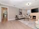 Spacious living area featuring hardwood floors and a view to a hallway at 3512 W Granada St, Tampa, FL 33629