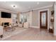 Bright living room featuring a fireplace and hardwood floors at 3512 W Granada St, Tampa, FL 33629