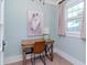 Charming home office features a wooden desk, comfortable chair, and natural light at 3512 W Granada St, Tampa, FL 33629