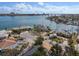 Aerial view of a house on a quiet waterfront street at 485 41St Ave, St Pete Beach, FL 33706