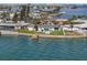 Aerial view of a waterfront home with a private dock at 485 41St Ave, St Pete Beach, FL 33706