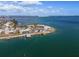 Aerial view of waterfront home with private dock and expansive water views at 485 41St Ave, St Pete Beach, FL 33706