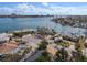 Property's waterfront location is highlighted in this wide aerial view at 485 41St Ave, St Pete Beach, FL 33706