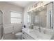 Bright bathroom with updated vanity and shower at 485 41St Ave, St Pete Beach, FL 33706