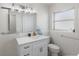 Clean bathroom with a vanity, toilet, and shower at 485 41St Ave, St Pete Beach, FL 33706