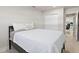 Comfortable bedroom with a queen-size bed and access to another room at 485 41St Ave, St Pete Beach, FL 33706
