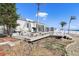Extended deck with multiple seating areas at 485 41St Ave, St Pete Beach, FL 33706