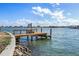 Wooden dock with water access, offering scenic waterfront views at 485 41St Ave, St Pete Beach, FL 33706