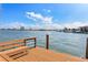 Relaxing waterfront dock with seating, enjoying scenic water views at 485 41St Ave, St Pete Beach, FL 33706