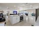 Open concept kitchen with large island and water views at 485 41St Ave, St Pete Beach, FL 33706