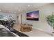 Living room with large TV and comfortable leather seating at 485 41St Ave, St Pete Beach, FL 33706
