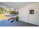View from back porch showing carport and yard at 215 35Th Ne Ave, St Petersburg, FL 33704
