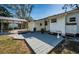 Gray deck and backyard with shed and trees at 215 35Th Ne Ave, St Petersburg, FL 33704