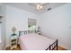 Cozy bedroom with a metal bed frame and light-colored bedding at 215 35Th Ne Ave, St Petersburg, FL 33704