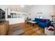 Open living space with hardwood floors and access to kitchen at 215 35Th Ne Ave, St Petersburg, FL 33704