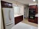 Kitchen with dark wood cabinets and modern appliances at 1182 Norwood Ave, Clearwater, FL 33756