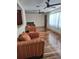 Bright living room featuring hardwood floors and ample natural light at 1182 Norwood Ave, Clearwater, FL 33756