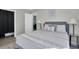 Bedroom with a queen bed, gray color scheme, and access to closet at 463 Park N St, St Petersburg, FL 33710
