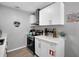 Newly renovated kitchen with white shaker cabinets and stainless steel appliances at 463 Park N St, St Petersburg, FL 33710