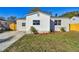 Front view of charming house with stone facade at 205 Kingston S St, St Petersburg, FL 33711