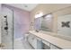 Bathroom with a walk-in shower and modern vanity at 11305 Sweet Bay Ct, Riverview, FL 33569