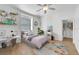 Charming bedroom with a walk-in closet and stylish decor at 11305 Sweet Bay Ct, Riverview, FL 33569
