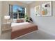 Bedroom with a queen bed and modern decor at 11305 Sweet Bay Ct, Riverview, FL 33569