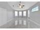 Bright bedroom with bay windows and ceiling fan at 11305 Sweet Bay Ct, Riverview, FL 33569