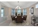 Bright dining room with a large table and chandelier at 11305 Sweet Bay Ct, Riverview, FL 33569