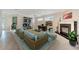 Cozy Gathering room featuring a fireplace and built-in shelving at 11305 Sweet Bay Ct, Riverview, FL 33569