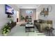 Relaxing sitting room with comfortable seating and stylish decor at 11305 Sweet Bay Ct, Riverview, FL 33569