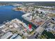 Aerial view showcasing the property's waterfront access and neighborhood context at 2691 Woodette Dr # D, Dunedin, FL 34698