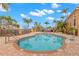 Sparkling community pool with ample deck space at 2691 Woodette Dr # D, Dunedin, FL 34698