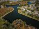 Aerial view showcasing the community's layout and waterfront property at 4993 Bostonian Loop # 4993, New Port Richey, FL 34655