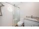 Updated bathroom with a walk-in shower and granite vanity at 4993 Bostonian Loop # 4993, New Port Richey, FL 34655