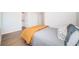 Comfortable bedroom with wood-look floors and access to bathroom at 4993 Bostonian Loop # 4993, New Port Richey, FL 34655