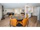 Open concept dining area with a view of kitchen and living room at 4993 Bostonian Loop # 4993, New Port Richey, FL 34655