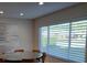 Dining area with round table and large window at 4993 Bostonian Loop # 4993, New Port Richey, FL 34655