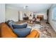 Spacious living room with a view of dining area and kitchen at 4993 Bostonian Loop # 4993, New Port Richey, FL 34655