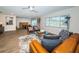 Open concept living room, dining, and kitchen area at 4993 Bostonian Loop # 4993, New Port Richey, FL 34655