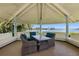 Charming gazebo featuring waterfront views, comfortable seating and bright and airy features at 9415 Blind Pass Rd # 905, St Pete Beach, FL 33706