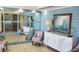 Inviting lobby area with designer furnishings, decor, and bright and airy lighting at 9415 Blind Pass Rd # 905, St Pete Beach, FL 33706
