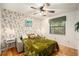 Versatile bedroom with sleeper sofa and colorful decor at 2383 Indian E Trl, Palm Harbor, FL 34683