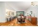 Elegant dining room with a large table and access to kitchen at 2383 Indian E Trl, Palm Harbor, FL 34683