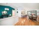 Open concept dining area with hardwood floors and stylish decor at 2383 Indian E Trl, Palm Harbor, FL 34683