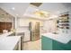 Updated kitchen featuring stainless steel appliances and quartz countertops at 2383 Indian E Trl, Palm Harbor, FL 34683