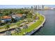 Luxury homes and palm trees line a scenic waterfront road at 102 S Moody Ave # 3, Tampa, FL 33609