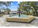 Octagonal fountain with ornate details and tiled base at 102 S Moody Ave # 3, Tampa, FL 33609